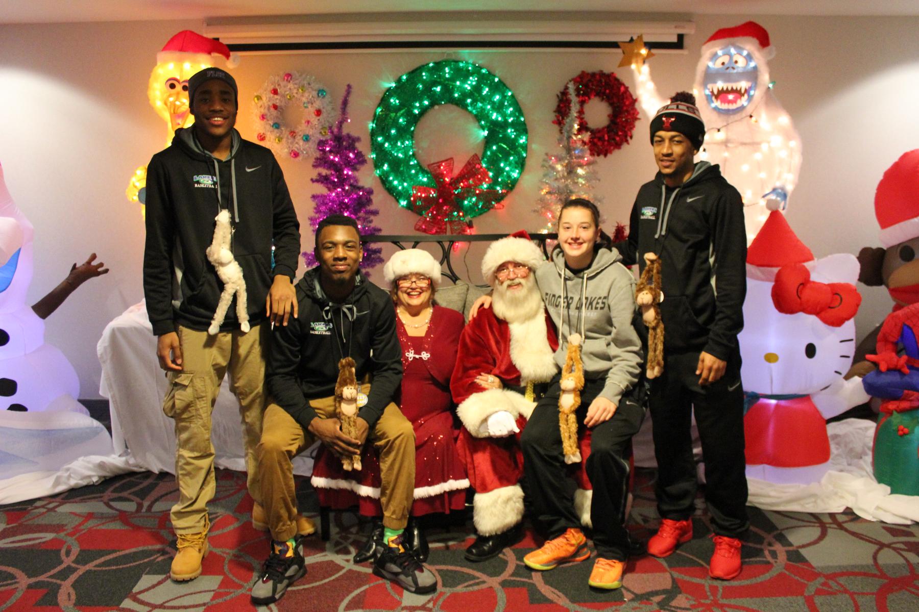 Student-Athletes Assist with Holiday Celebrations at Holiday Inn